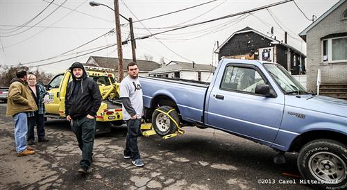Taurozzi is pleased that his truck was returned, although stripped of all his tools while in the custody of the DOT. Joe of Gateway Demo, speaking to DOT tow truck driver Tom, in the background 